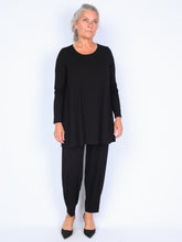 Some long blouse with pleats in the back